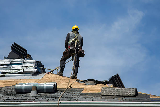 Professional Roof Replacement technician working in Ossian, IN